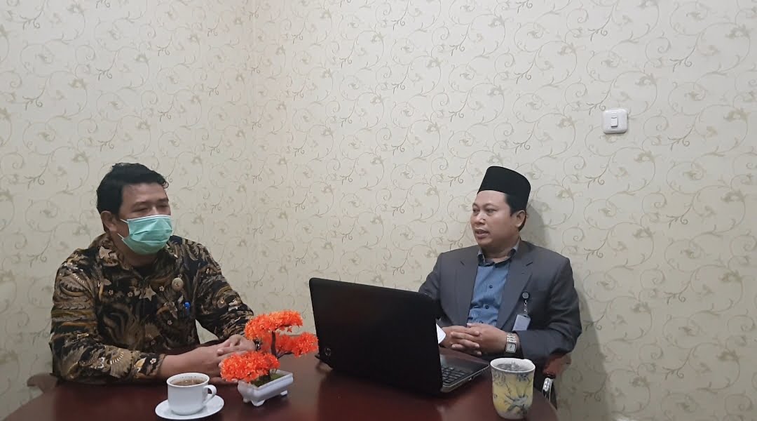 Anggota Kompolnas, H.Mohammad Dawam,S.HI,MH, bersama Mohammad Shayan Komisioner Komisi Informasi RI, Bidang Regulasi Dan Kebijakan Publik